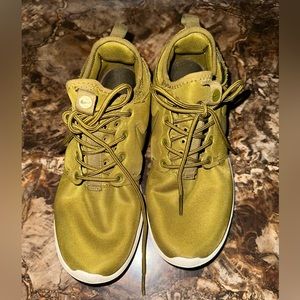 Olive green Nike Roshe.